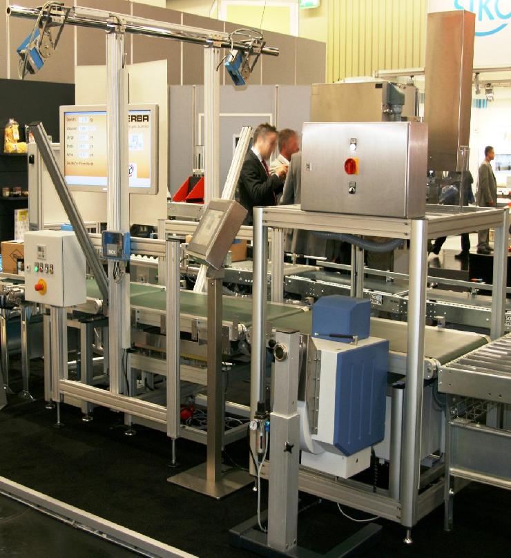 Post-Expo 2012: Bizerba präsentiert automatisches System zum Dimensionieren, Wiegen und Scannen (DWS)